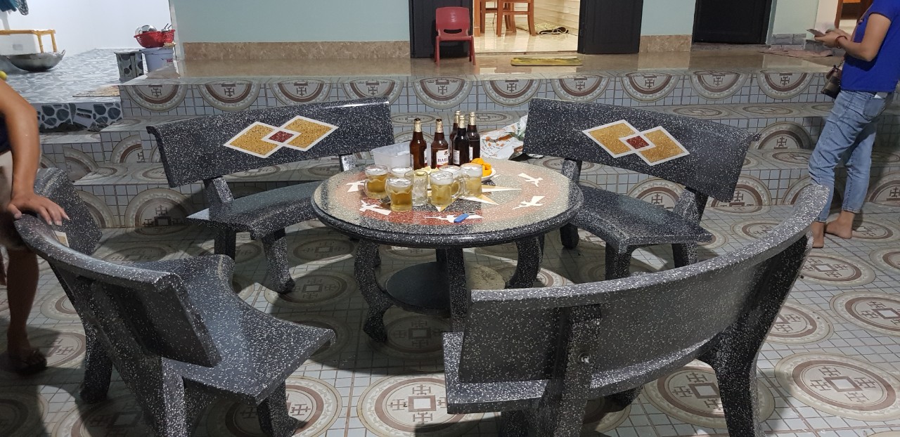 Bàn ghế đá học tiết trống đồng